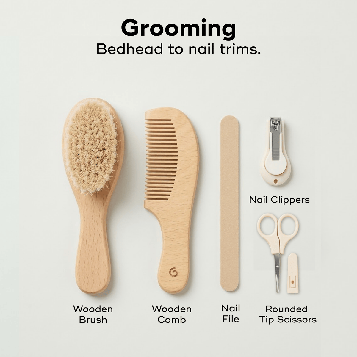 Contents of the Babymoov baby grooming kit: wooden brush, wooden comb, nail file, baby nail scissors, baby nail clippers.